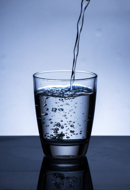 istock The image of pouring drinking water, into a glass, 1409613727