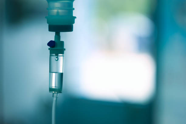 Set iv fluid intravenous drop saline drip hospital stock photo