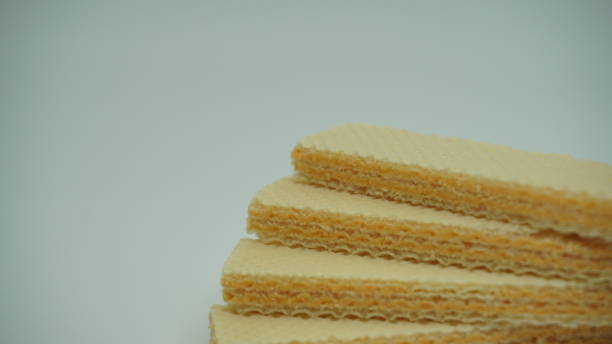 istock Tasty wafer sticks on white background 1409614755