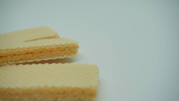 istock Tasty wafer sticks on white background 1409615630
