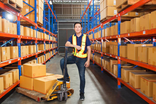 istock Senior staff portrait in warehouse. 1409615675