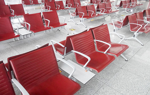 Row of red chairs at airport