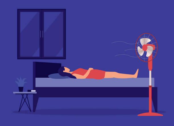 ilustraciones, imágenes clip art, dibujos animados e iconos de stock de mujer durmiendo en la cama mientras tiene un ventilador eléctrico soplando directamente sobre ella. - enfriamiento
