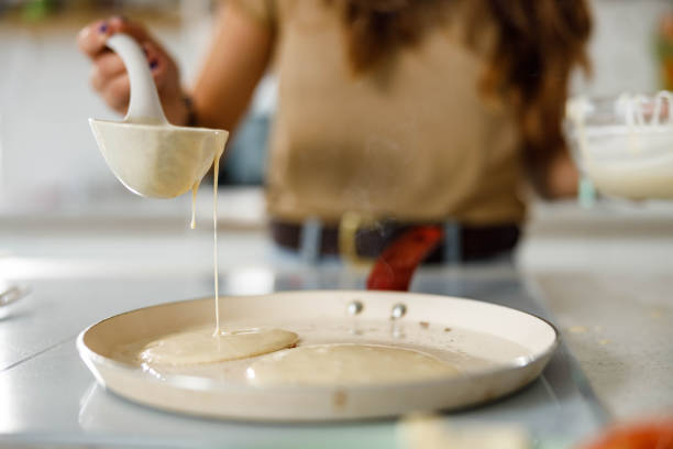 istock Close up of making pancakes. 1409624126