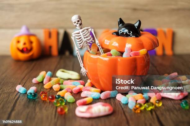 Happy Halloween Day With Ghost Candies Pumpkin Bowl Jack O Lantern And Decorative Trick Or Threat Hello October Fall Autumn Festive Party And Holiday Concept Stock Photo - Download Image Now