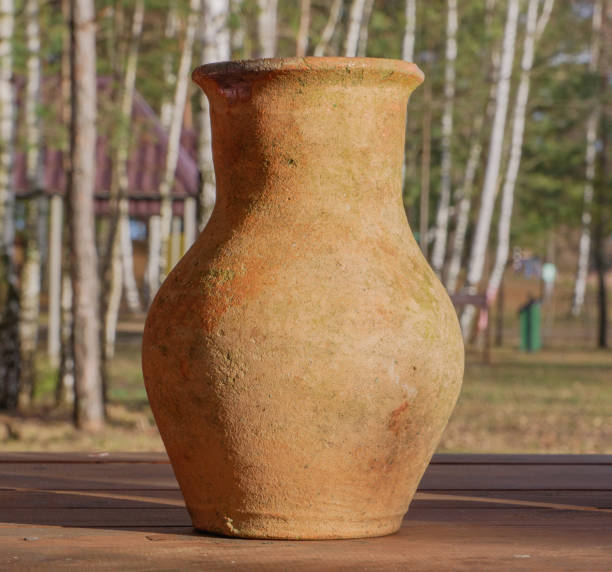 istock Earthenware jug on the countryside close-up. 1409632560