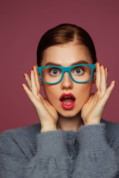 istock Beautiful emotional woman with bright make-up 1409634022