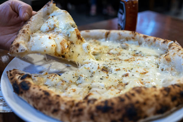 istock Popular Italian Food Cheese Pizza 1409634685