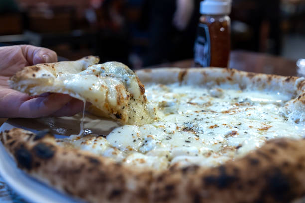 istock Popular Italian Food Cheese Pizza 1409634821