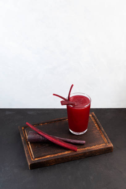 Salgam - popular Turkish drink, made from fermented purple carrots, turnips or beets. Selective focus, space for text
