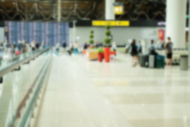 istock airport terminal departures board hall blurred background 1409643276