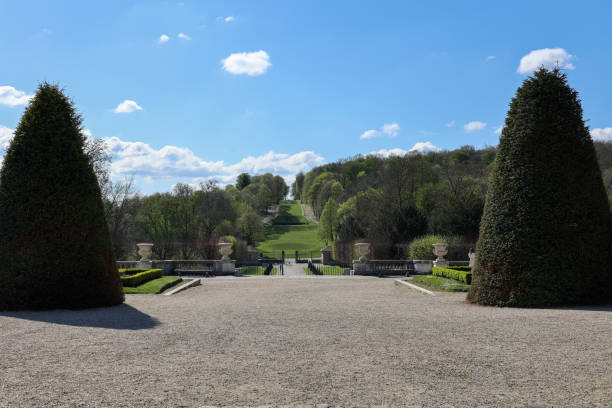 french gardens and pathways in saint-cloud park in paris, springtime