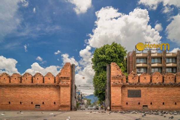 Time lapse view of the famous tourist location Tha Phae Gate in Chiang Mai, Thailand Chiang Mai, Thailand - 18 July 2022 - Time lapse view of the famous tourist location Tha Phae Gate in Chiang Mai, Thailand chiang mai province stock pictures, royalty-free photos & images