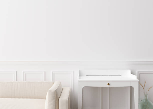 istock Empty white wall in modern living room. Mock up interior in contemporary style. Free, copy space for your picture, text, or another design. Sofa, table, vase with dried grass. 3D rendering. 1409647405