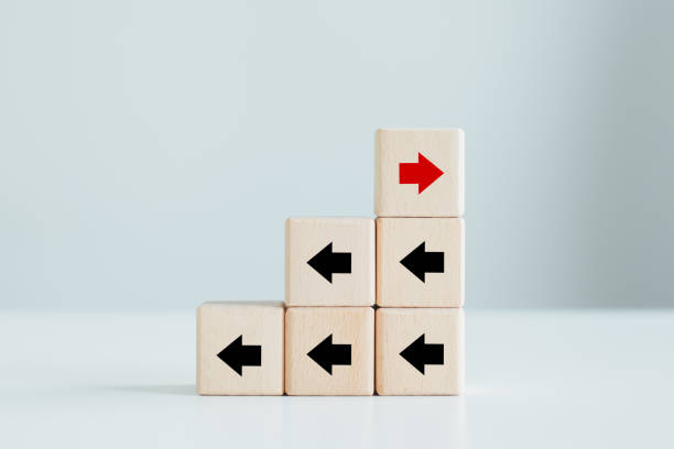 istock Red arrow has different direction black arrow. Think outside the box. 1409648718