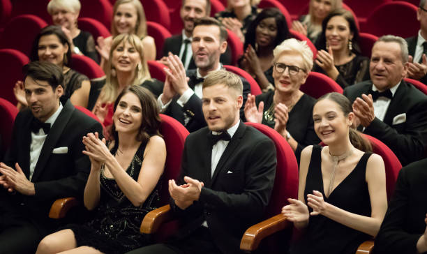 istock Excited audience clapping in opera house 1409648831
