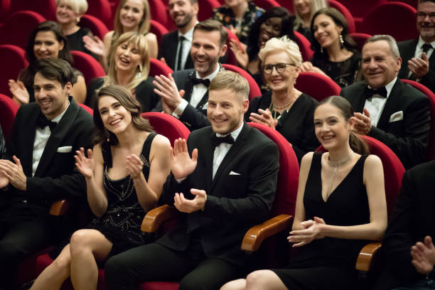 istock Excited audience clapping in opera house 1409648913