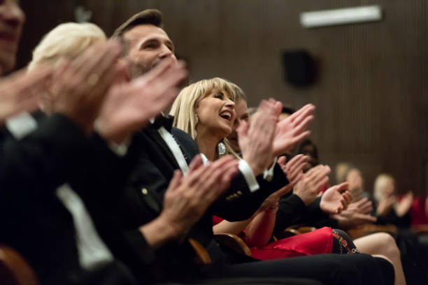 istock Excited audience clapping in the theater 1409649138