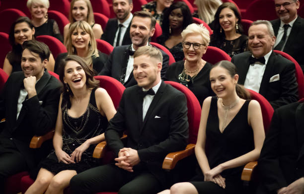 istock Happy audience sitting in opera house 1409649358