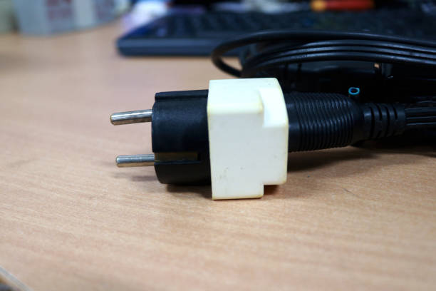 istock Charger cable for laptop or portable computer 1409649446