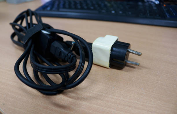 istock Charger cable for laptop or portable computer 1409649447