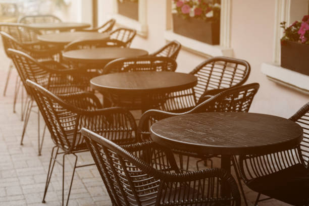 istock Empty tables of street cafe. 1409652428