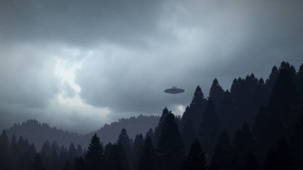 istock 3D illustration. UFO over the mountains 1409652500