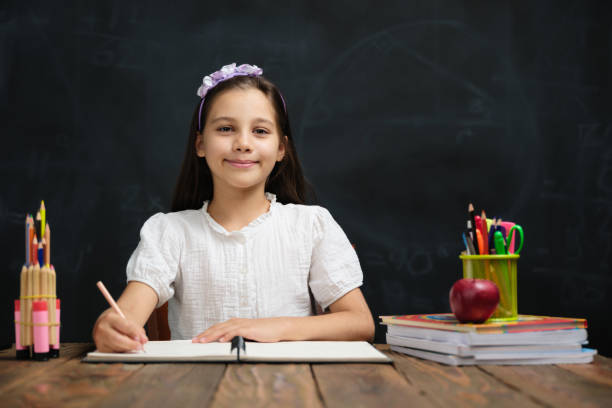 istock Back To School Concept, Happy Smiling Child Student Studying 1409653718