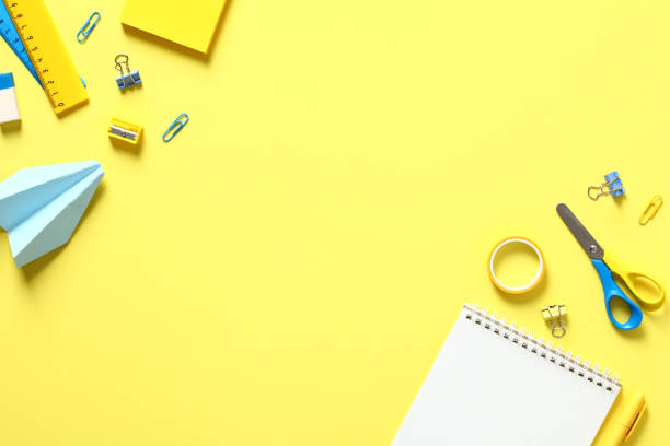 istock Flat lay school supplies on yellow background. Flat lay, top view, copy space. Back to school concept. 1409655806