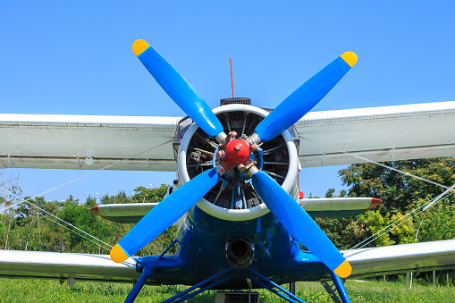 Close view of old airplane blue propeller