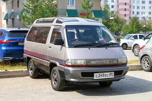 Novyy Urengoy, Russia - July 16, 2022: Compact minivan Toyota TownAce in the city street.