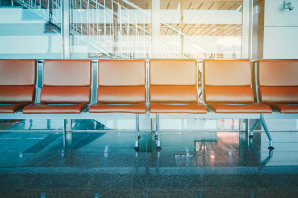 istock Empty seat at airport terminal waiting area. 1409659648