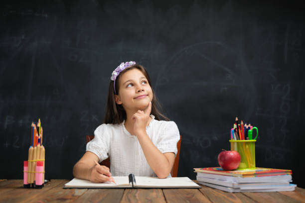 istock Back To School Concept, Happy Smiling Child Student Studying 1409659930