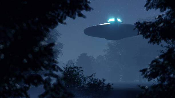 istock 3d ufo flew over the wild forest at night 1409661188