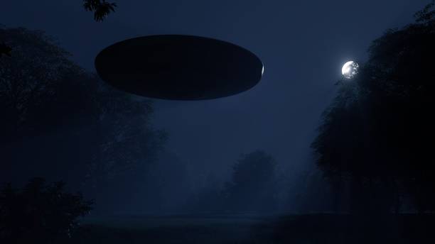 istock 3d ufo flew over the wild forest at night 1409661250