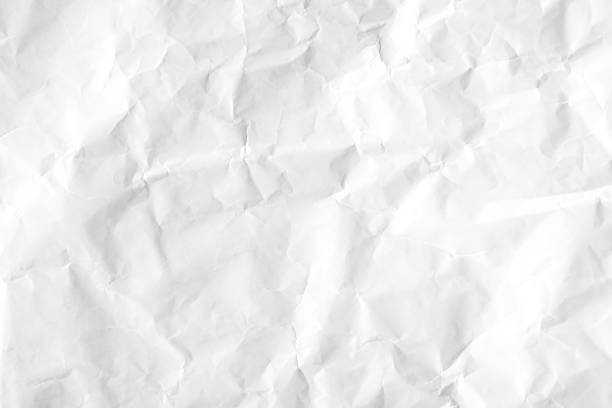 istock White crumpled or wrinkle paper texture background 1409661899