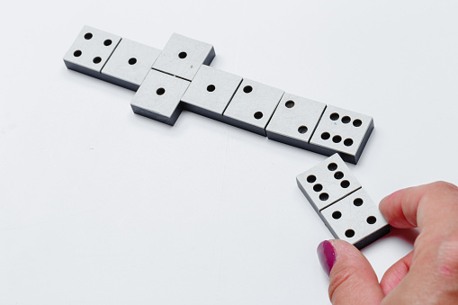 dominoes game on a wooden table