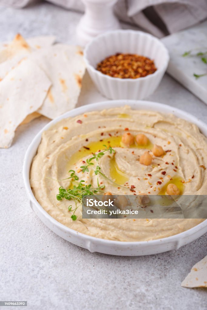 Hummus from chickpeas and pita bread. Hummus from chickpeas and pita flat bread. Healthy vegetarian food Appetizer Stock Photo