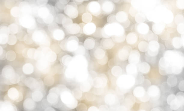 istock Abstract white and gold bokeh celebration background 1409664533