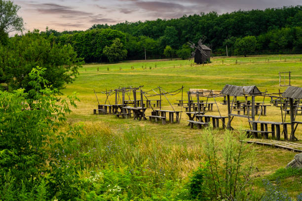 Ancient mills. Field with windmills on a summer day