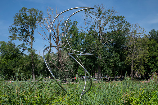 Milan, Italy - April 8, 2023: Milan, Lombardy, Italy: garden along via Marco de Marchi