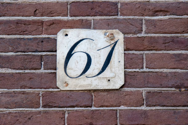 istock Close Up 61 House Number At Amsterdam The Netherlands 1409669699