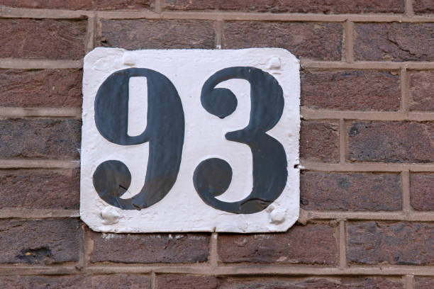 istock Close Up House Number 93 At Amsterdam The Netherlands 1409670825