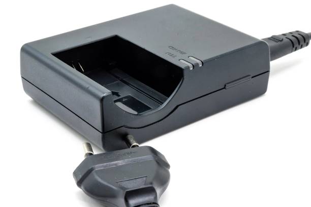 istock battery charger for photo camera on white background 1409671901