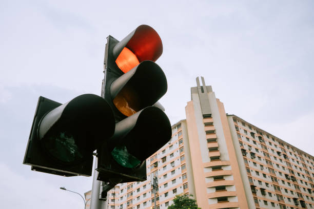 istock Malaysia red light traffic stop after rain 1409673062