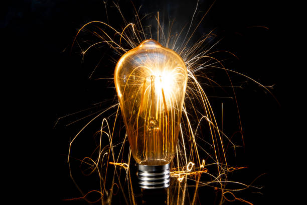 istock Light bulb and sparkler symbolizing energy 1409679451