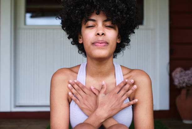 istock Woman does breathing exercises. 1409682307