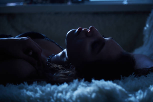 istock woman in moon light 1409685755