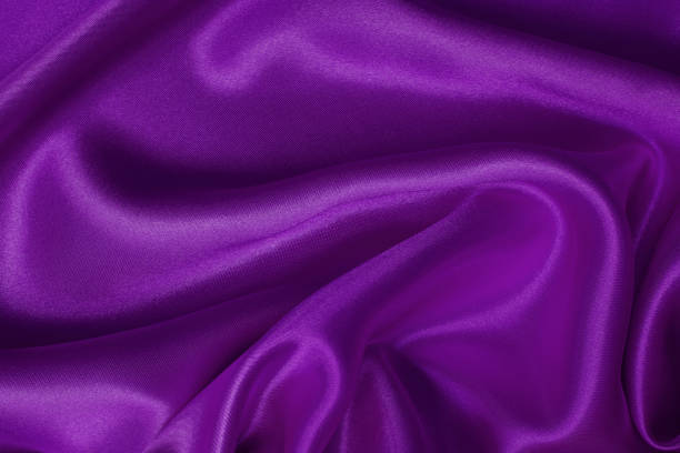 istock Dark purple fabric texture background, detail of silk or linen pattern. 1409686028