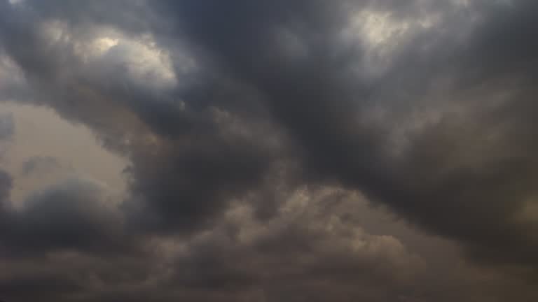 Timelapse sky with incoming black clouds.